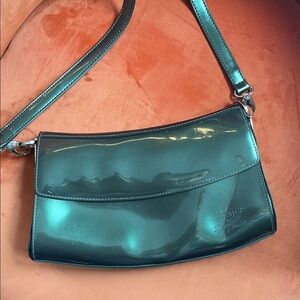 Beijo green patent leather handbag, designed by Susan Handley.